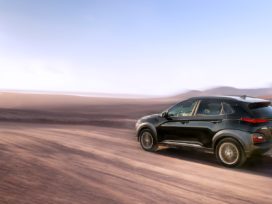 black suv on brown sand during daytime