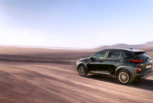 black suv on brown sand during daytime