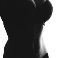 grayscale photo of sweating woman